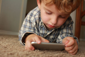 Boy On Playing on Speech Apps